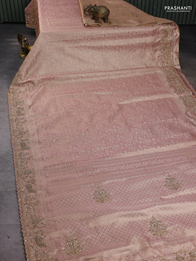 Kanchipuram silk saree peach pink with allover zari woven brocade weaves and embroidered border