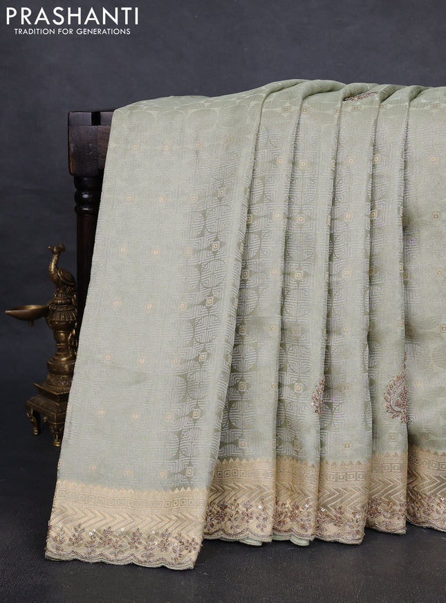 Kanchipuram silk saree pista green with allover zari woven brocade weaves and embroidery pallu