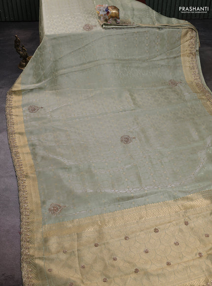 Kanchipuram silk saree pista green with allover zari woven brocade weaves and embroidery pallu
