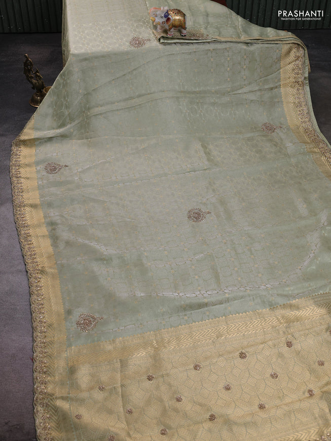 Kanchipuram silk saree pista green with allover zari woven brocade weaves and embroidery pallu