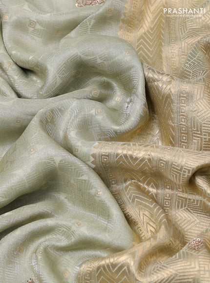 Kanchipuram silk saree pista green with allover zari woven brocade weaves and embroidery pallu