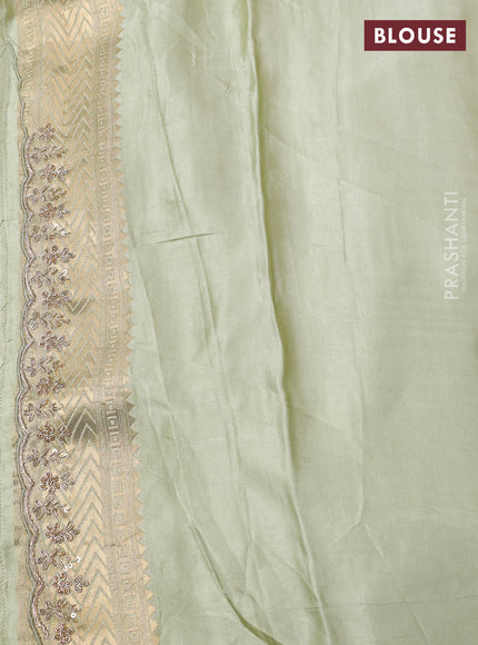 Kanchipuram silk saree pista green with allover zari woven brocade weaves and embroidery pallu