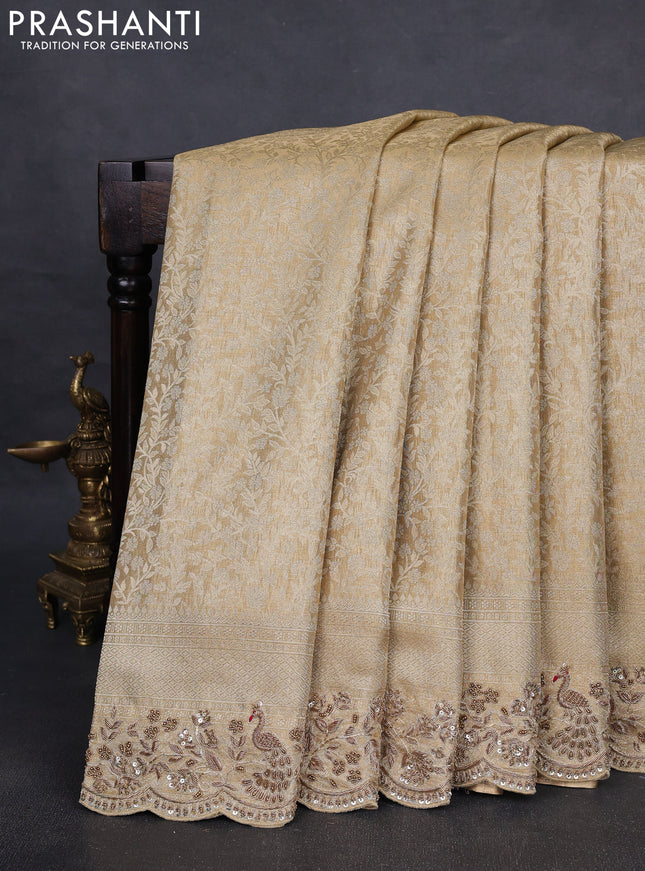 Kanchipuram silk saree gold with allover zari woven brocade weaves and embroidered border