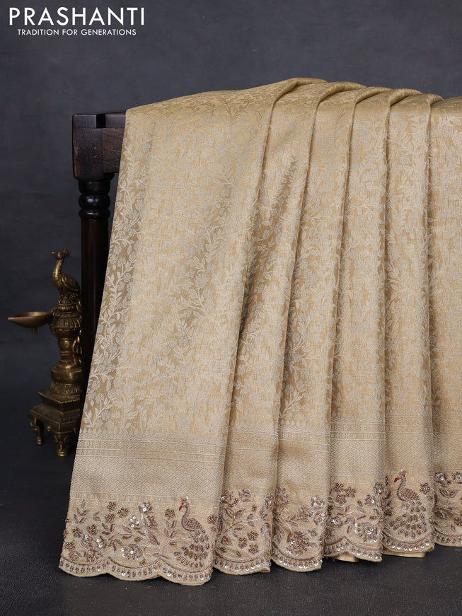 Kanchipuram silk saree gold with allover zari woven brocade weaves and embroidered border