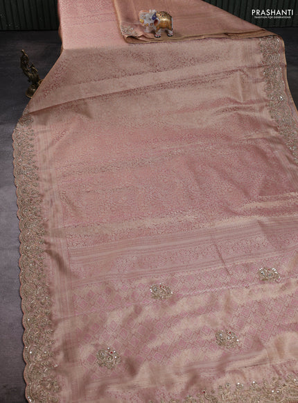 Kanchipuram silk saree pastel pink with allover zari woven brocade weaves and embroidered border