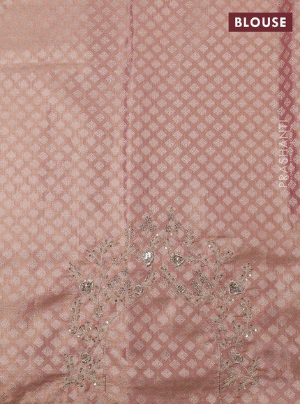 Kanchipuram silk saree pastel pink with allover zari woven brocade weaves and embroidered border