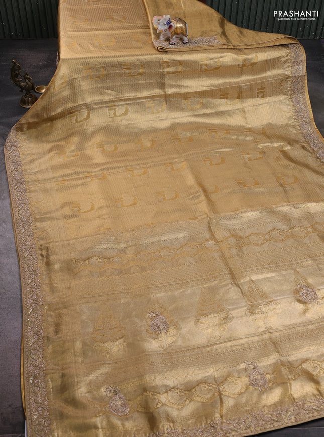 Kanchipuram silk saree gold with allover zari woven brocade weaves and embroidered border