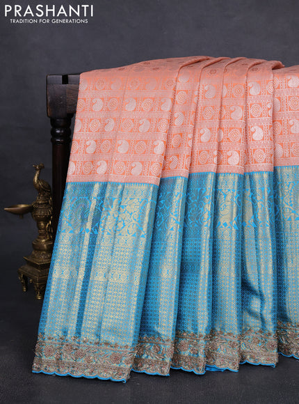 Kanchipuram silk saree cs blue and peach with allover zari woven brocade weaves and embroidered border