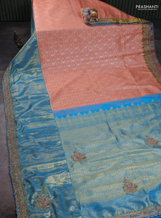 Kanchipuram silk saree cs blue and peach with allover zari woven brocade weaves and embroidered border