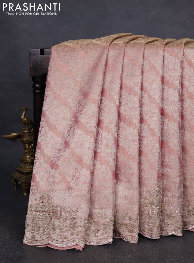 Kanchipuram silk saree mild peach with allover zari woven brocade weaves and embroidered border