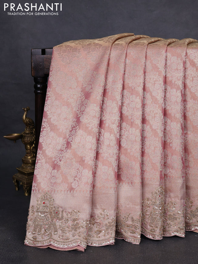 Kanchipuram silk saree mild peach with allover zari woven brocade weaves and embroidered border