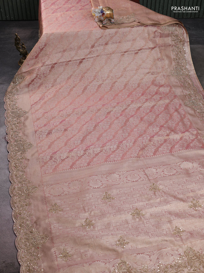 Kanchipuram silk saree mild peach with allover zari woven brocade weaves and embroidered border