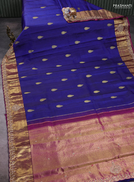 Kanchipuram silk saree purple with allover zari woven brocade weaves and embroidered border