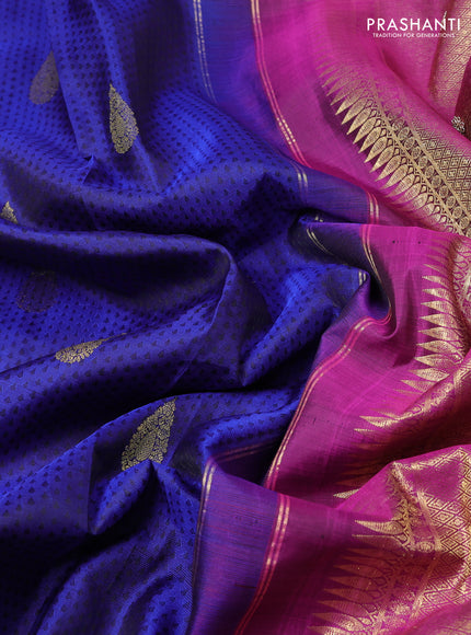 Kanchipuram silk saree purple with allover zari woven brocade weaves and embroidered border