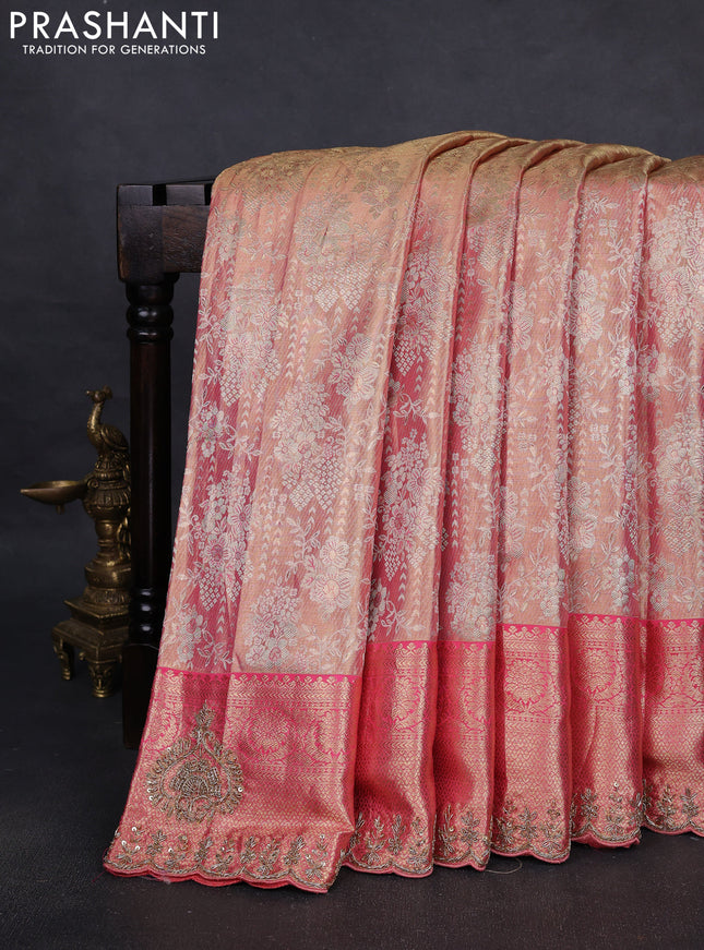 Kanchipuram silk saree peach pink with allover zari woven brocade weaves and embroidered border