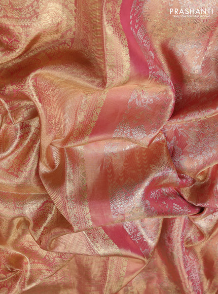 Kanchipuram silk saree peach pink with allover zari woven brocade weaves and embroidered border