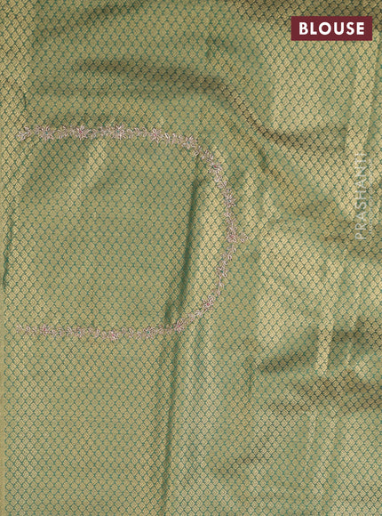 Kanchipuram silk saree green with allover zari woven brocade weaves and embroidered border