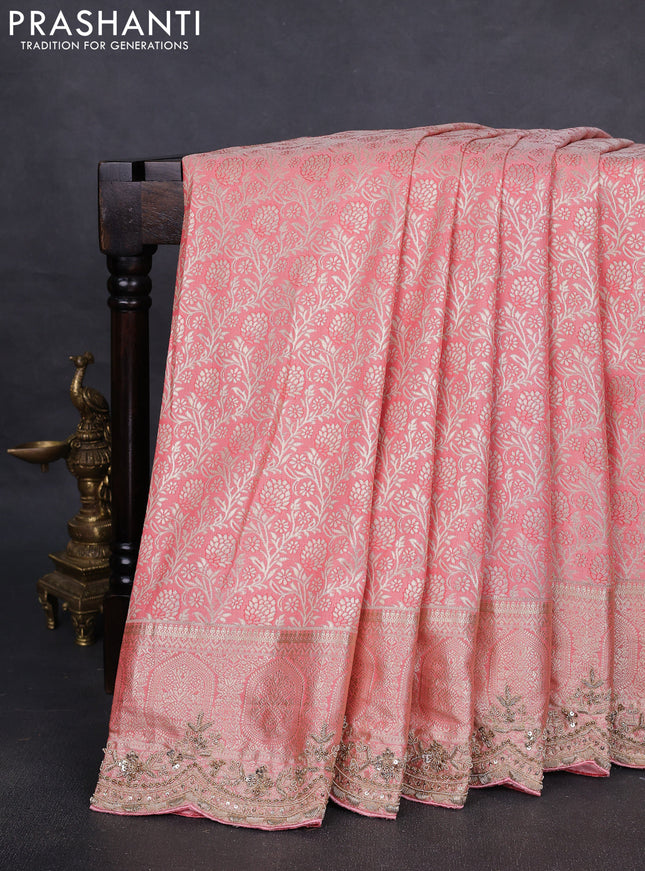 Kanchipuram silk saree peach pink with allover zari woven brocade weaves and embroidered border