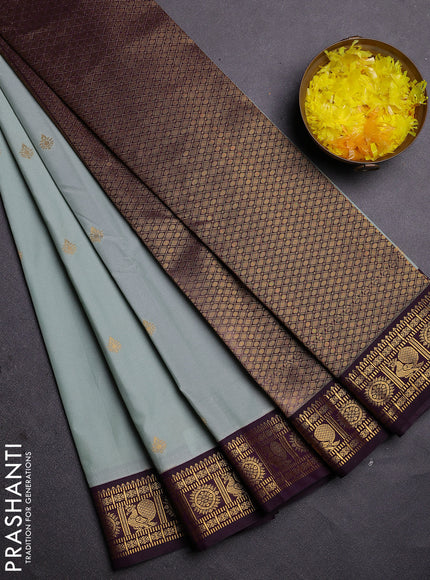 Semi kanchipuram silk saree pastel blue and deep wine with zari woven buttas and zari woven korvai border