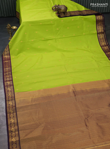 Semi kanchipuram silk saree light green and deep wine with zari woven buttas and zari woven korvai border