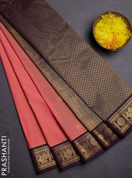 Semi kanchipuram silk saree peach pink and deep wine with zari woven buttas and zari woven korvai border