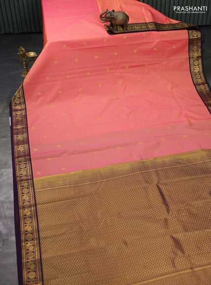 Semi kanchipuram silk saree peach pink and deep wine with zari woven buttas and zari woven korvai border