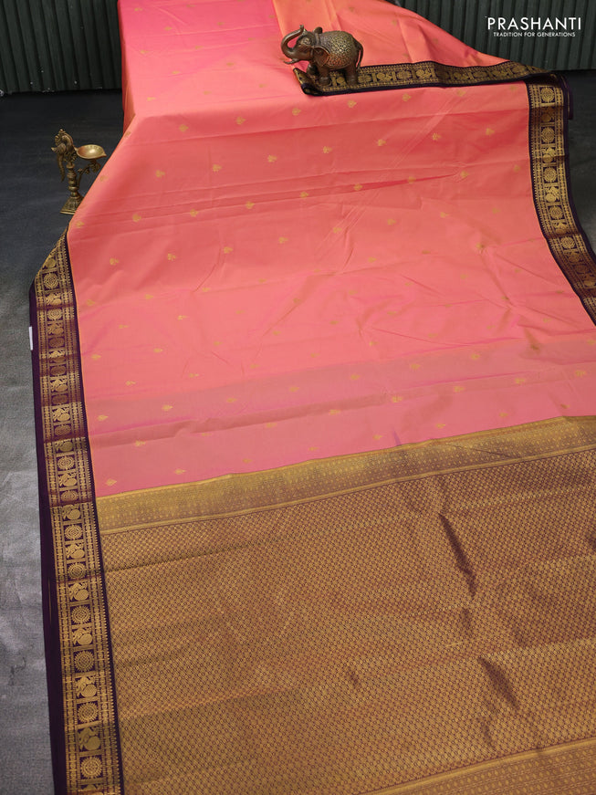 Semi kanchipuram silk saree peach pink and deep wine with zari woven buttas and zari woven korvai border