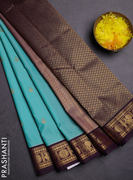 Semi kanchipuram silk saree teal blue and deep wine with zari woven buttas and zari woven korvai border