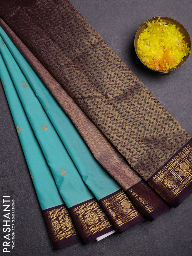 Semi kanchipuram silk saree teal blue and deep wine with zari woven buttas and zari woven korvai border