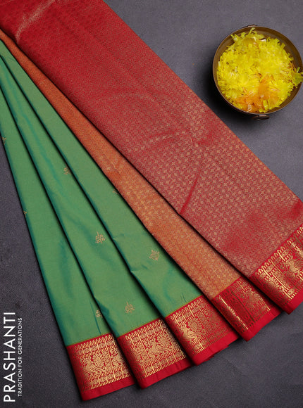 Semi kanchipuram silk saree light green and red with zari woven buttas and zari woven korvai border
