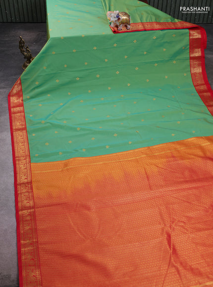 Semi kanchipuram silk saree light green and red with zari woven buttas and zari woven korvai border