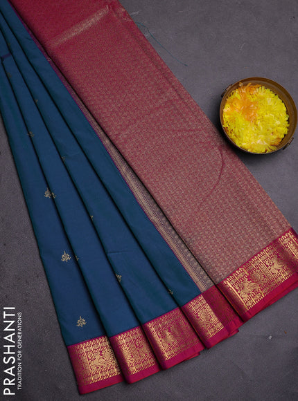 Semi kanchipuram silk saree teal blue and pink with zari woven buttas and zari woven korvai border