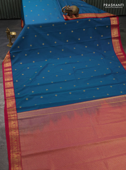 Semi kanchipuram silk saree teal blue and pink with zari woven buttas and zari woven korvai border
