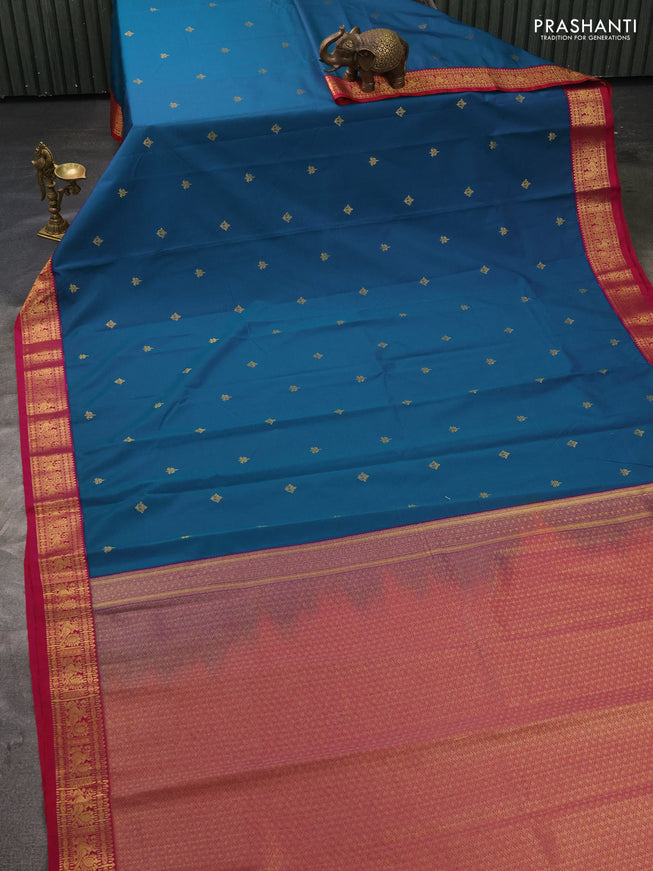 Semi kanchipuram silk saree teal blue and pink with zari woven buttas and zari woven korvai border