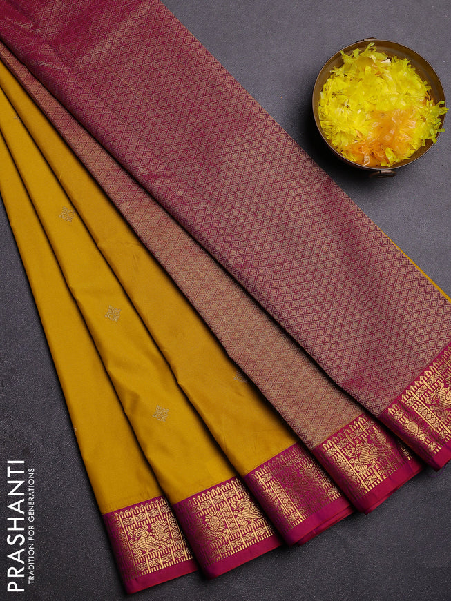 Semi kanchipuram silk saree yellow and pink with zari woven buttas and zari woven korvai border