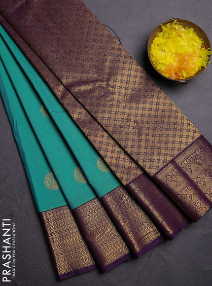 Semi kanchipuram silk saree teal green and deep violet with zari woven buttas and zari woven korvai border