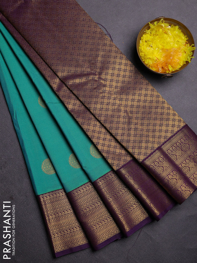 Semi kanchipuram silk saree teal green and deep violet with zari woven buttas and zari woven korvai border