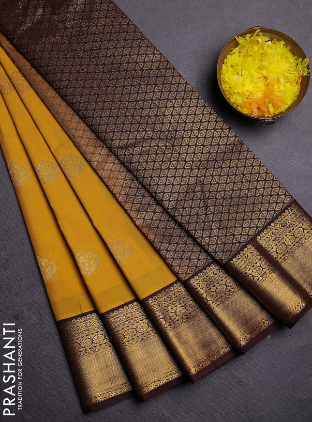 Semi kanchipuram silk saree yellow and coffee brown with zari woven buttas and zari woven korvai border