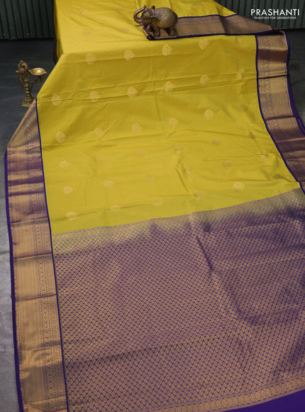 Semi kanchipuram silk saree yellow and navy blue with zari woven buttas and zari woven korvai border