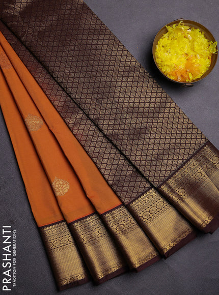 Semi kanchipuram silk saree dark mustard and brown with zari woven buttas and zari woven korvai border