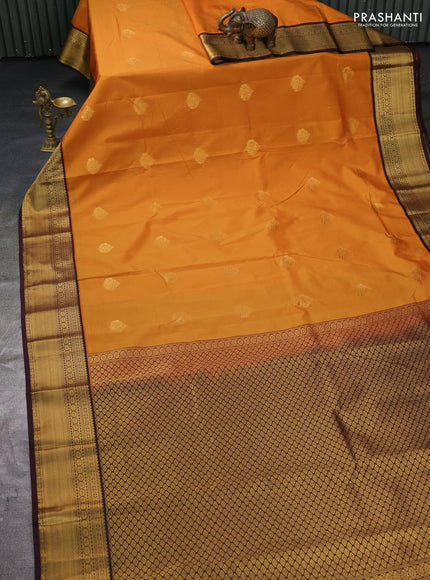 Semi kanchipuram silk saree dark mustard and brown with zari woven buttas and zari woven korvai border