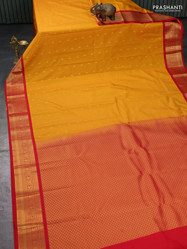 Semi kanchipuram silk saree mustard yellow and red with zari woven buttas and zari woven korvai border