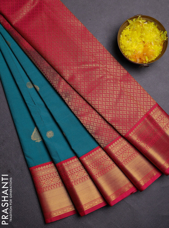 Semi kanchipuram silk saree teal green and pink with zari woven buttas and zari woven korvai border