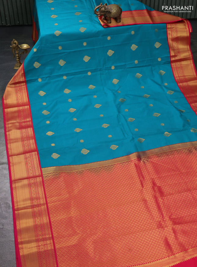 Semi kanchipuram silk saree teal green and pink with zari woven buttas and zari woven korvai border