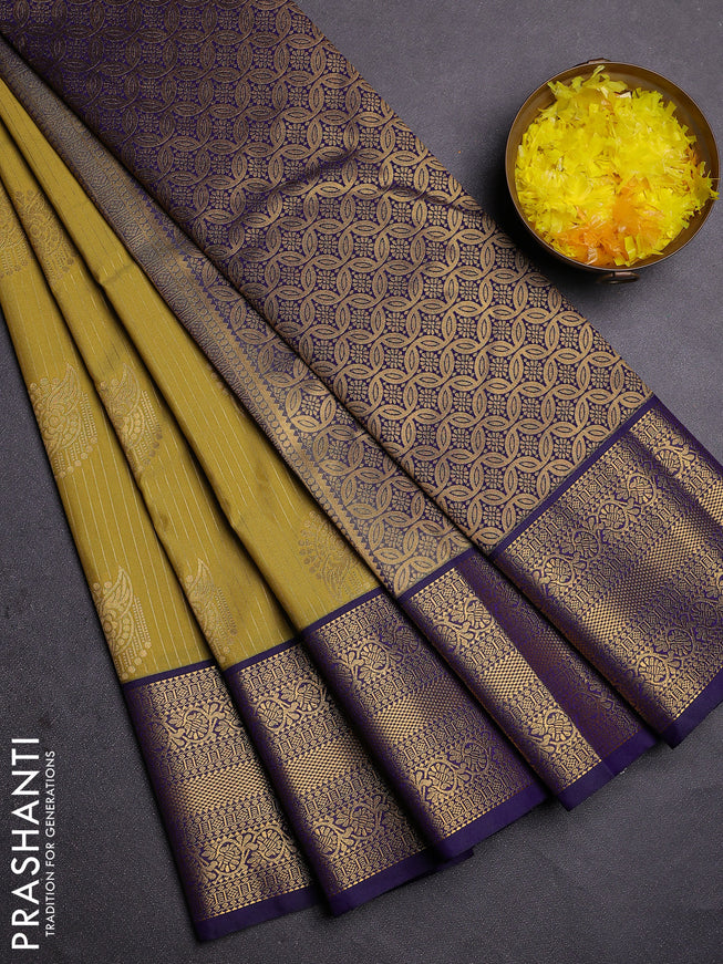 Semi kanchipuram silk saree pista green and blue with allover zari weaves and zari woven korvai border