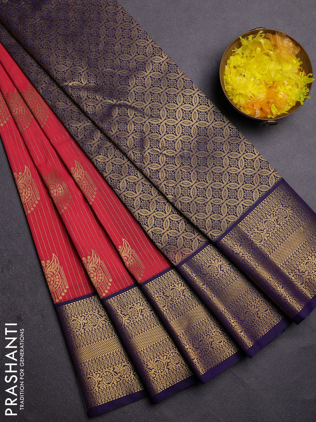 Semi kanchipuram silk saree reddish pink and blue with allover zari weaves and zari woven korvai border