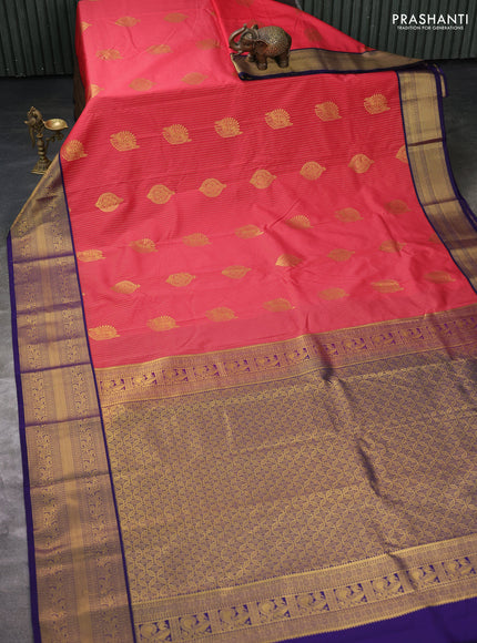 Semi kanchipuram silk saree reddish pink and blue with allover zari weaves and zari woven korvai border