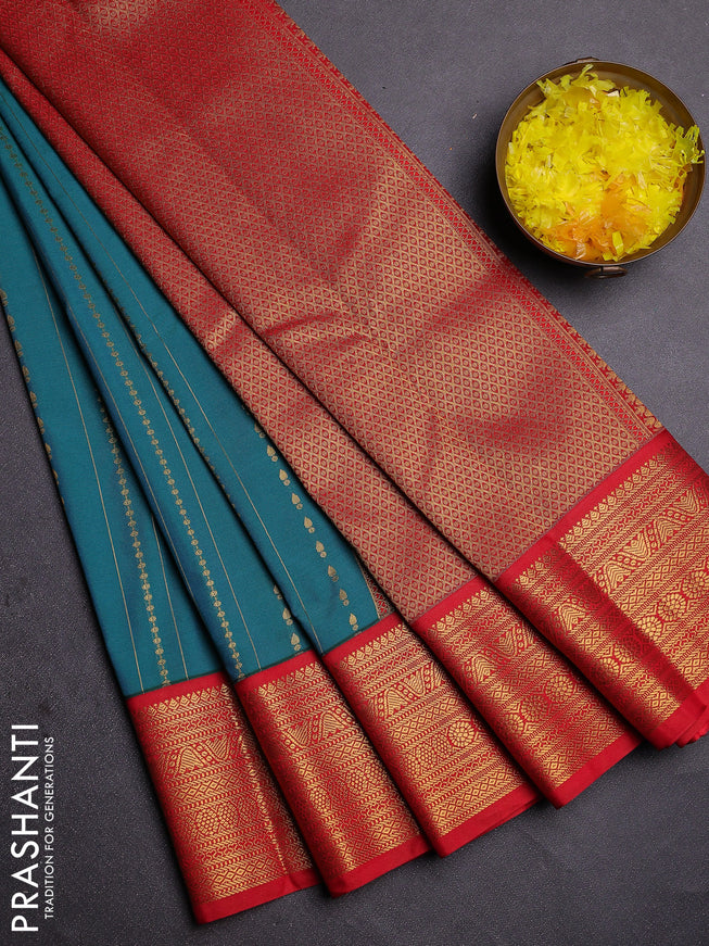 Semi kanchipuram silk saree teal blue and red with allover zari weaves and zari woven korvai border