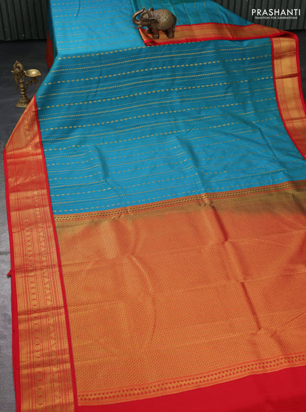 Semi kanchipuram silk saree teal blue and red with allover zari weaves and zari woven korvai border
