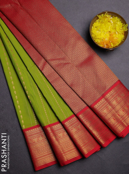 Semi kanchipuram silk saree light green and red with allover zari weaves and zari woven korvai border